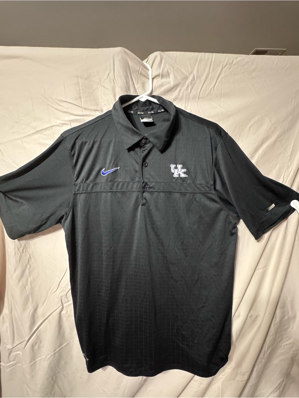Nike Men’s Black Polo with Blue Swoosh and White UK Logo